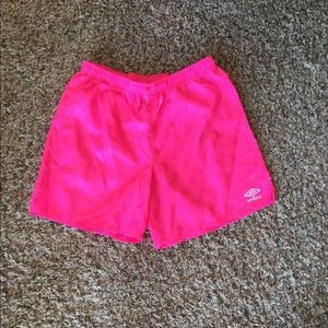 Neon pink soccer shorts